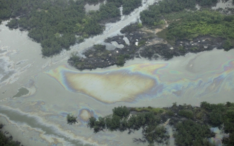 A large oil spill near Nigeria's Brass facility, run by ENI, has spread through the sea and swamps of the oil producing Niger Delta region